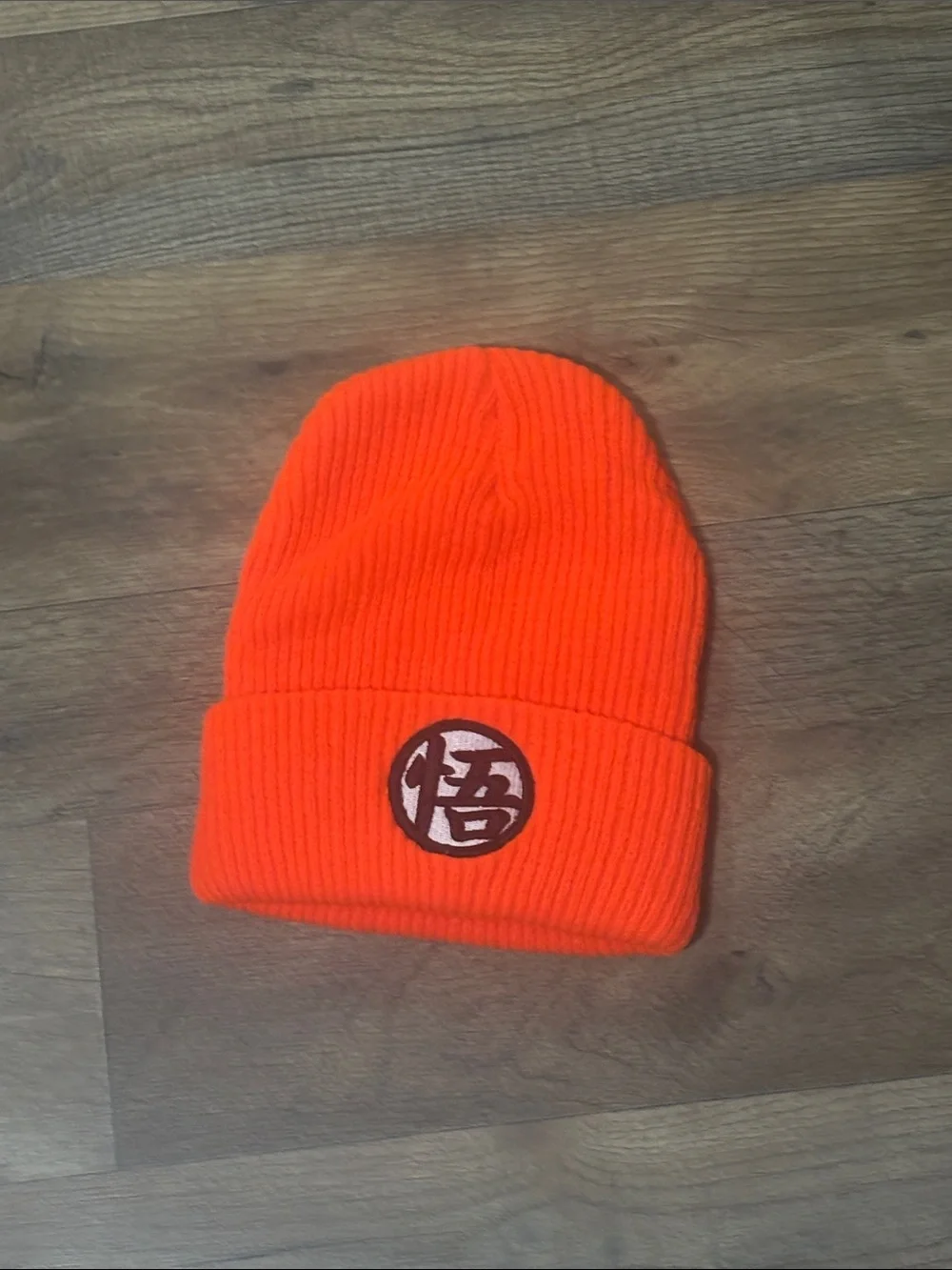 Kids Orange Knit Beanie with Embroidered Symbol